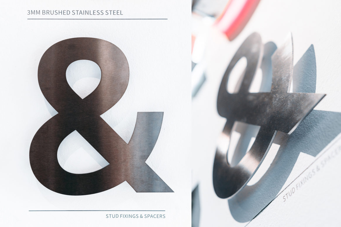 GlyphicsAmpersands_6_3mm-Brushed-Stainless-steel-1166x777